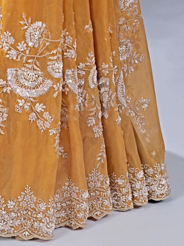 Gold silk saree with haldi perfect finish