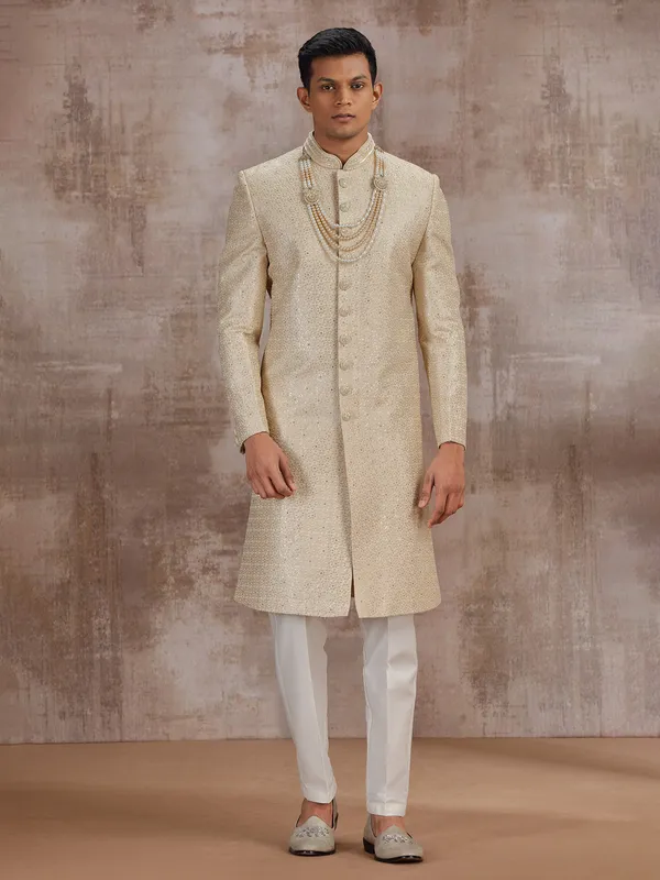 Gold silk wedding sherwani for groom
