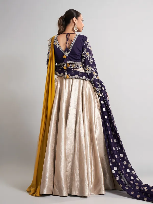 Golden and purple lehenga choli with attached dupatta