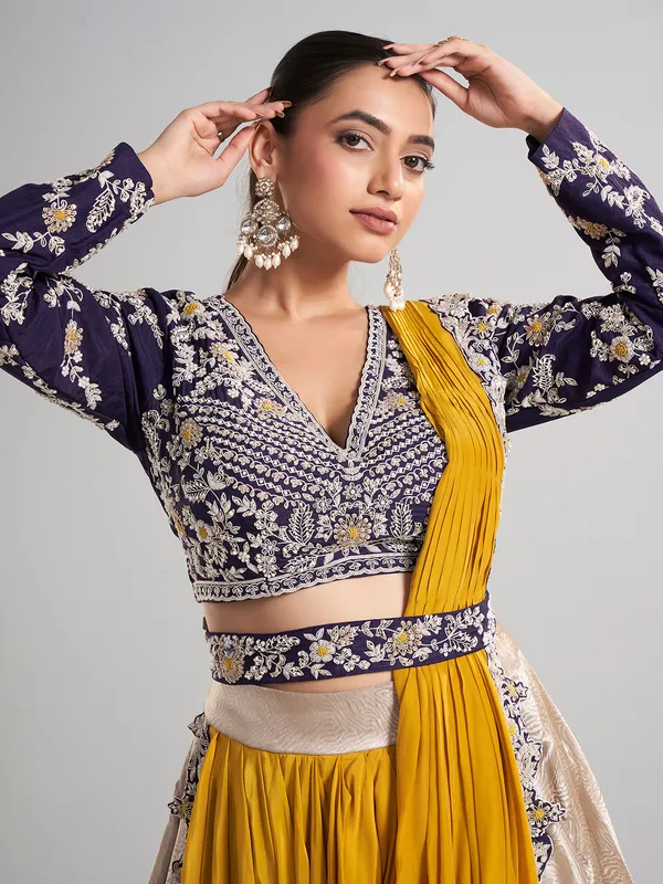 Golden and purple lehenga choli with attached dupatta