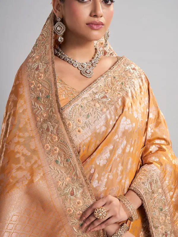 Golden banarasi silk saree with intricate zari for wedding wear
