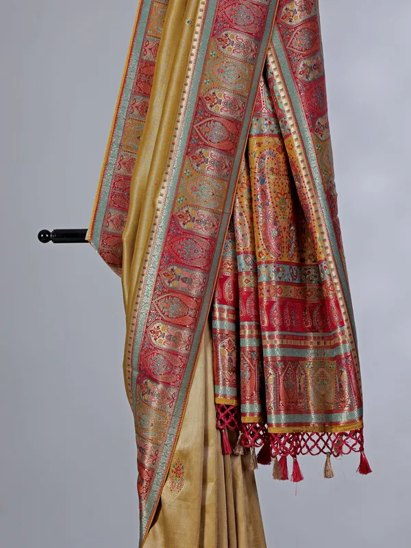Golden dola tissue silk saree with zari embellishments