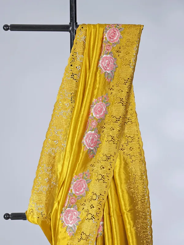Golden semi silk saree with elegant cutwork and embroidery
