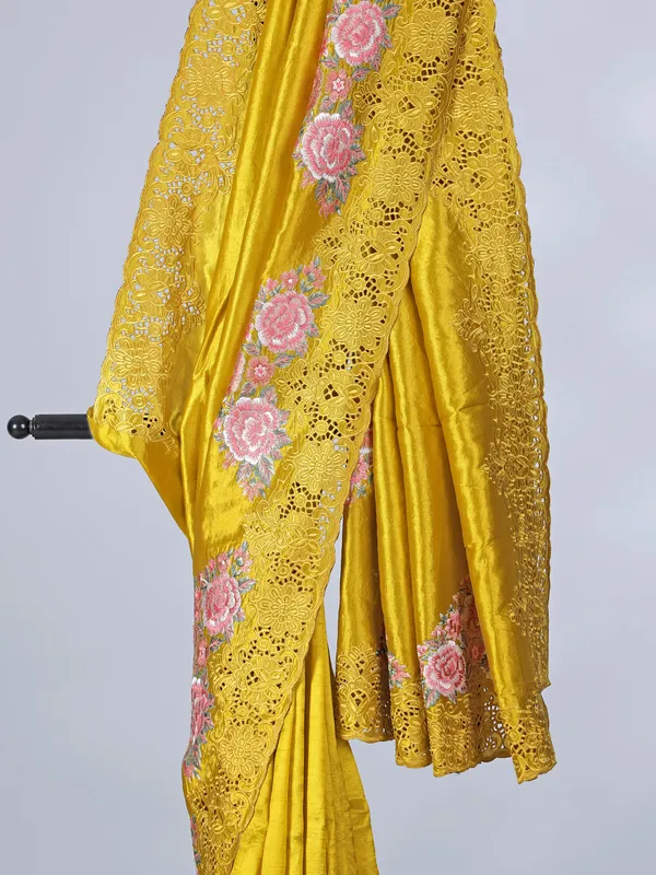 Golden semi silk saree with elegant cutwork and embroidery