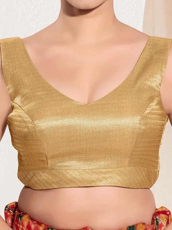 Golden silk ready made blouse in zari weaving