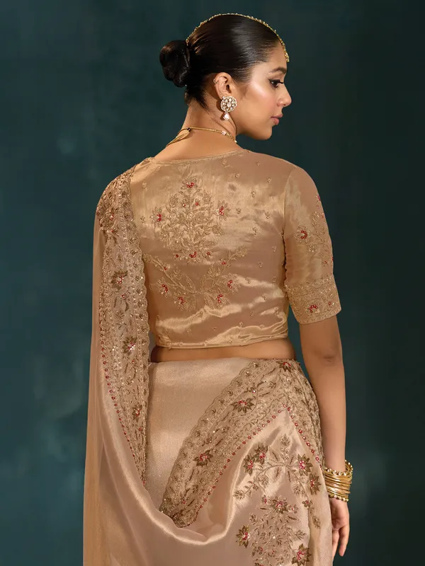 Golden silk saree for festive celebration