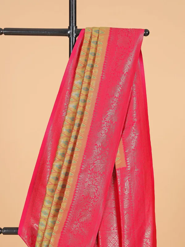 Golden silk saree with attractive pink pallu