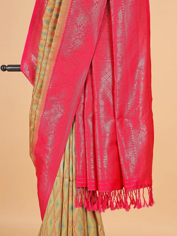 Golden silk saree with attractive pink pallu
