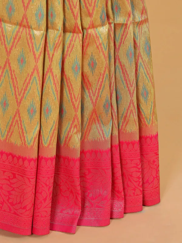 Golden silk saree with attractive pink pallu