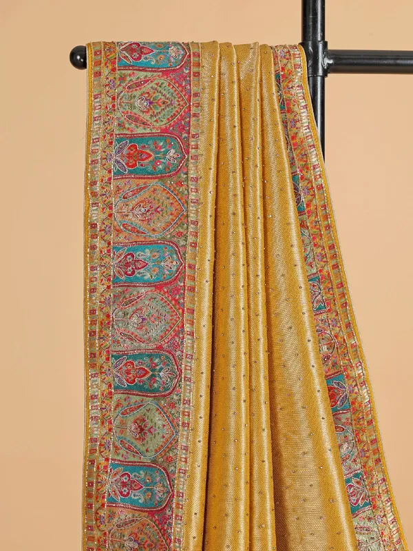 Golden silk saree with print for wedding