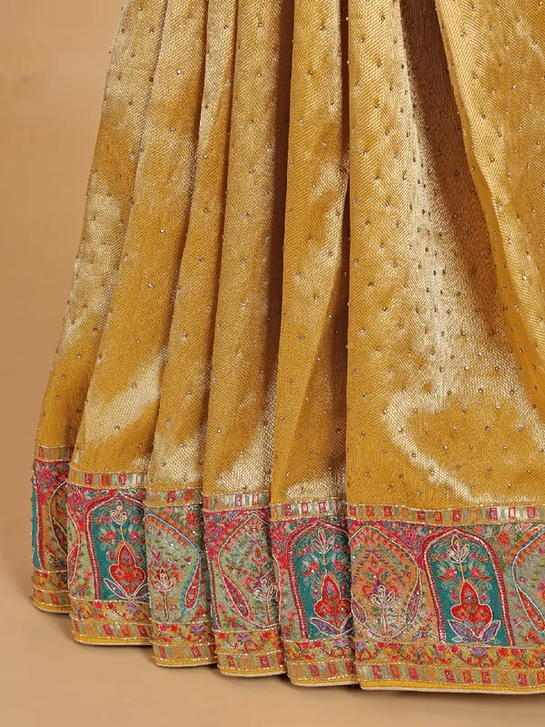 Golden silk saree with print for wedding