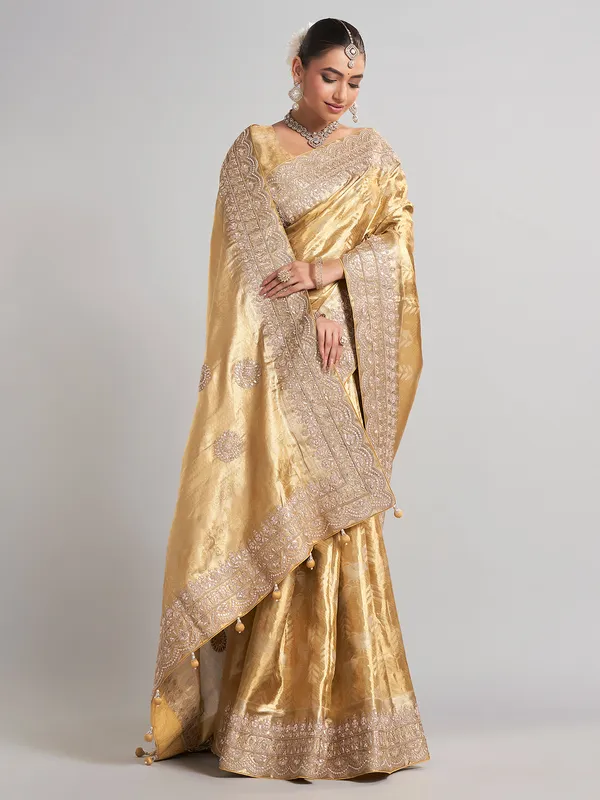 Golden tissue kanjivaram silk saree with luxurious zari work