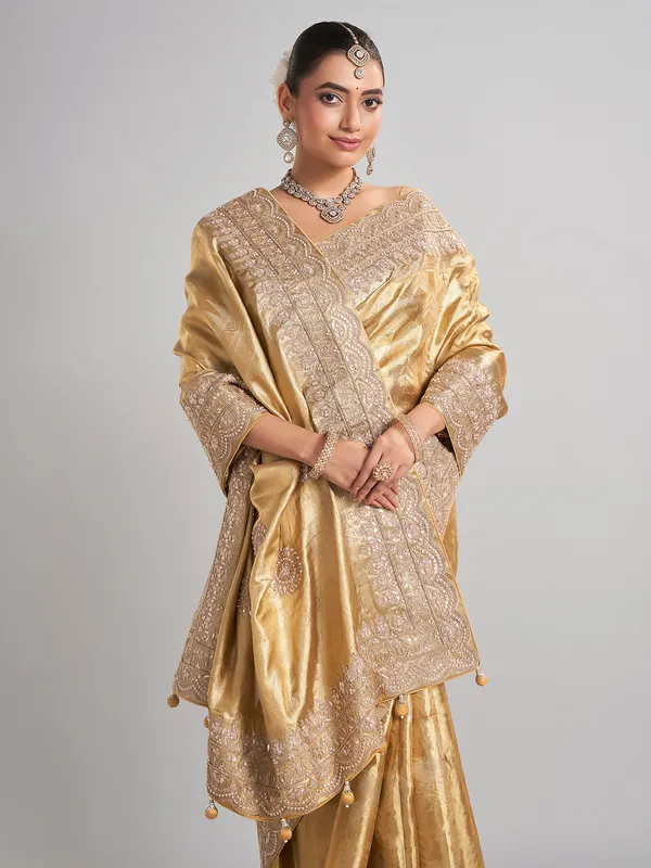 Golden tissue kanjivaram silk saree with luxurious zari work