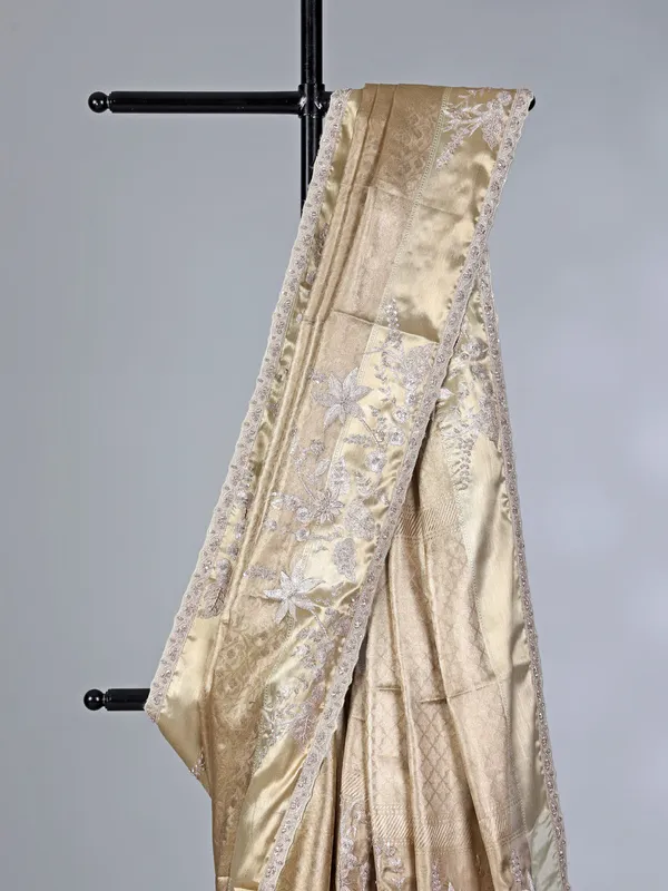 Golden tissue silk rich embellished saree for wedding wear