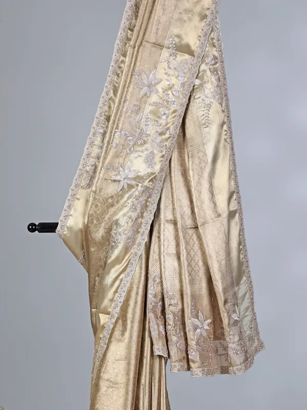 Golden tissue silk rich embellished saree for wedding wear