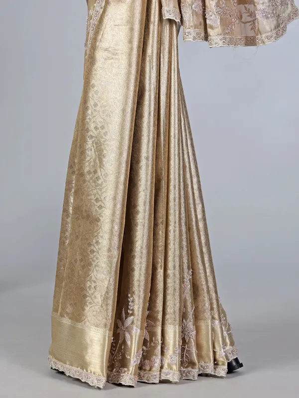 Golden tissue silk rich embellished saree for wedding wear