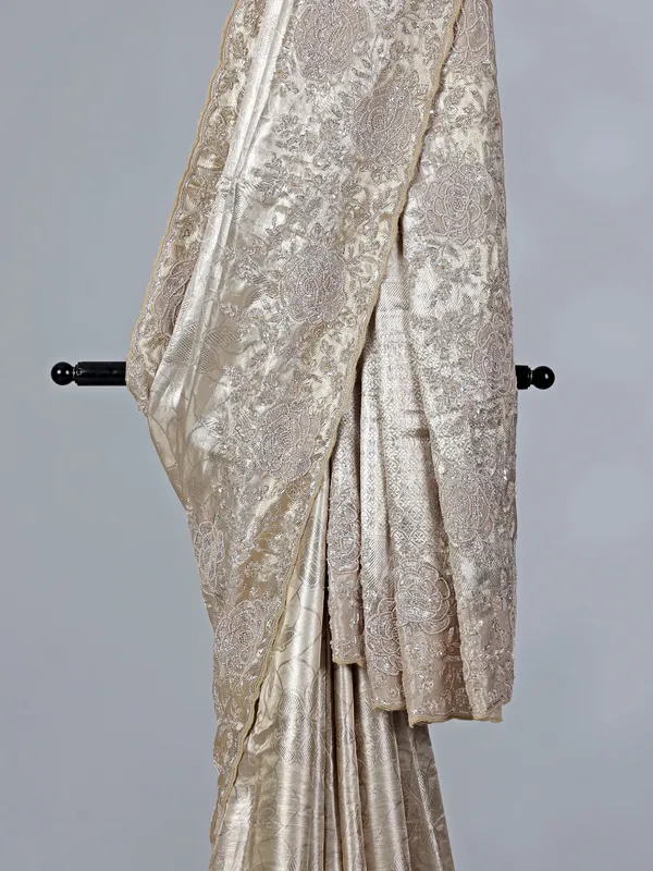 Golden tissue silk saree with bridal embellishments