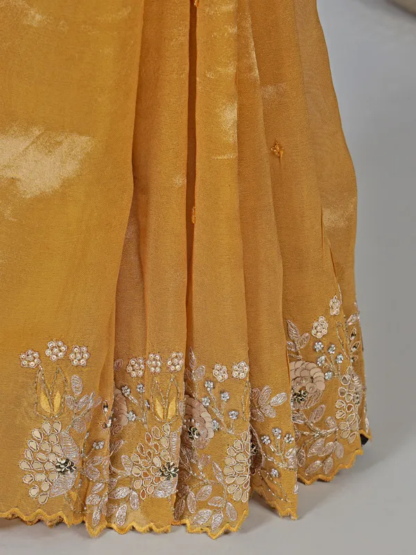 Golden tissue silk saree with diamond embellishments