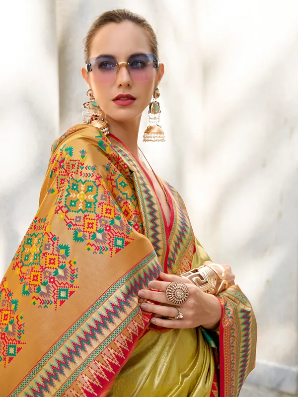 Golden tissue silk saree with zari weaving