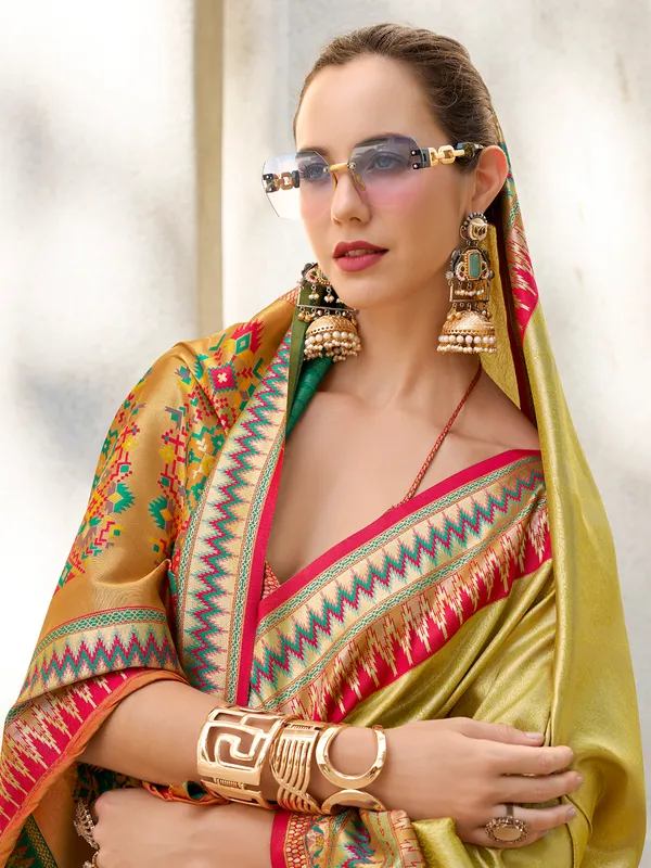 Golden tissue silk saree with zari weaving