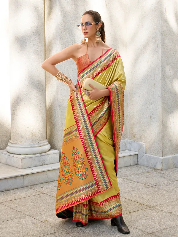 Golden tissue silk saree with zari weaving