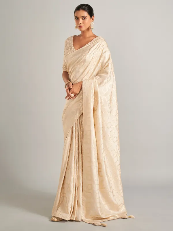 Gorgeous cream silk saree in zari work