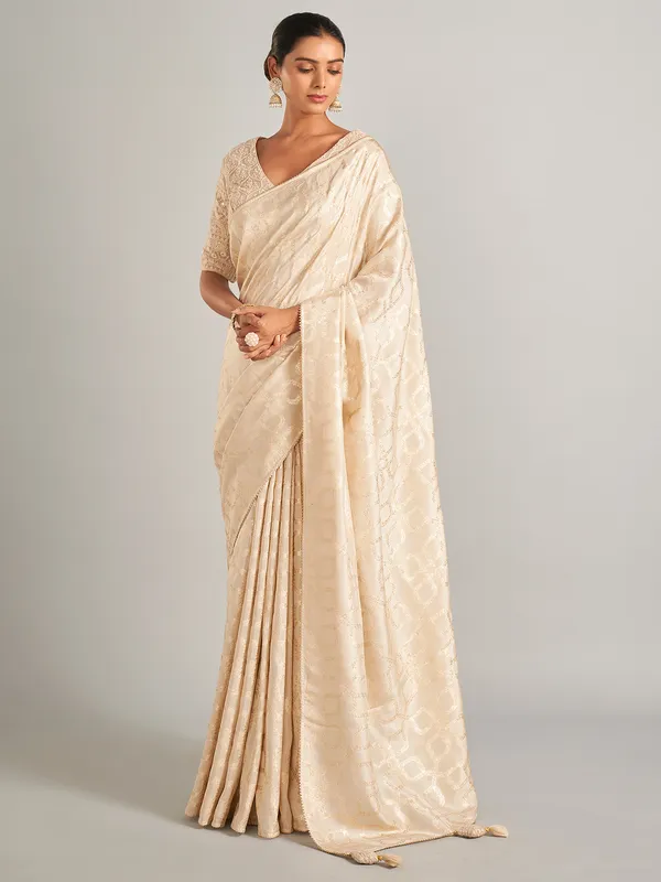 Gorgeous cream silk saree in zari work