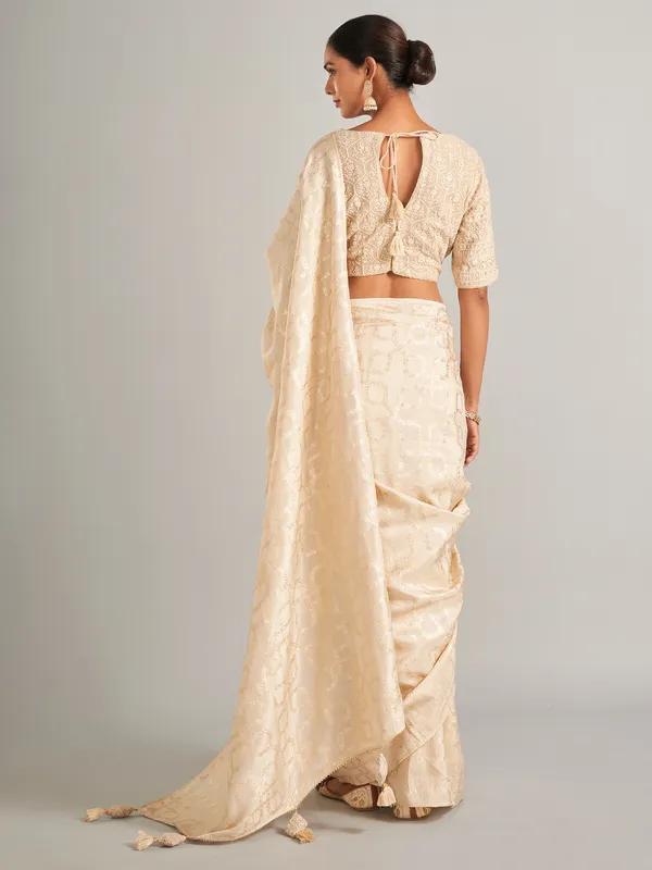 Gorgeous cream silk saree in zari work
