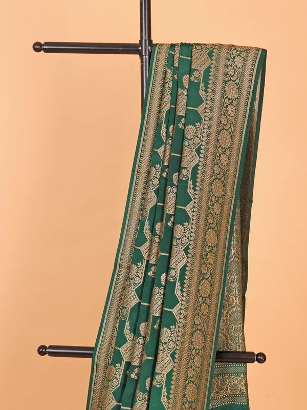 Gorgeous dark green silk sari with zari work