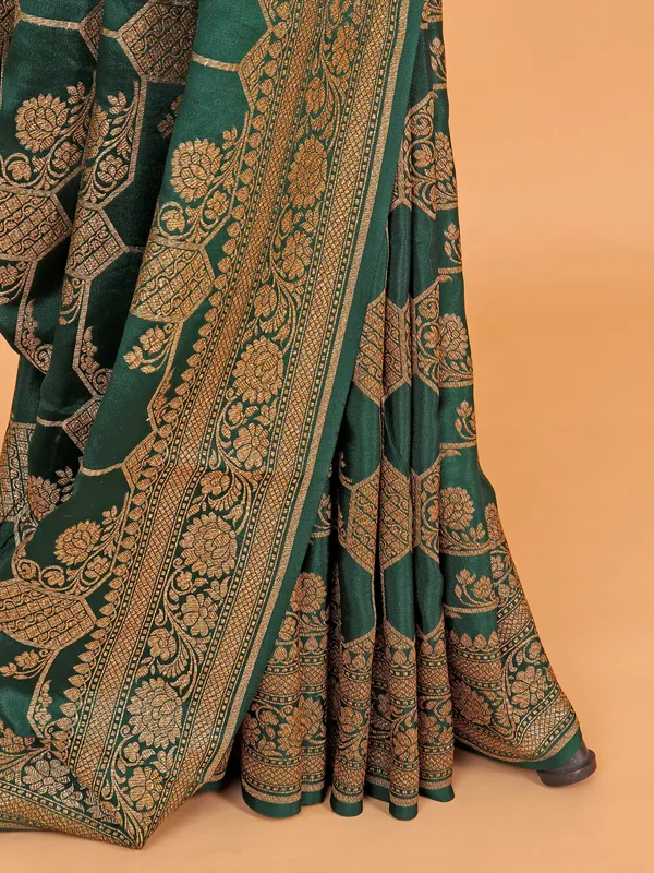 Gorgeous dark green silk sari with zari work