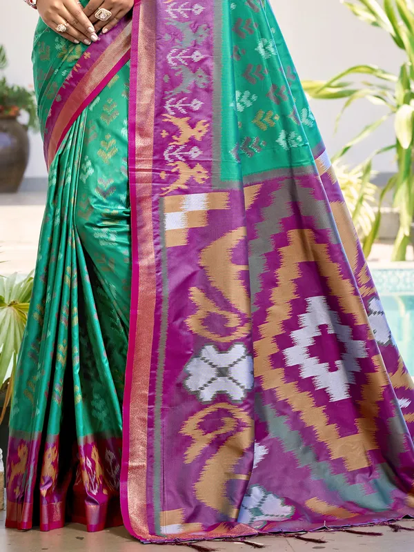 Gorgeous green silk saree for festive moments