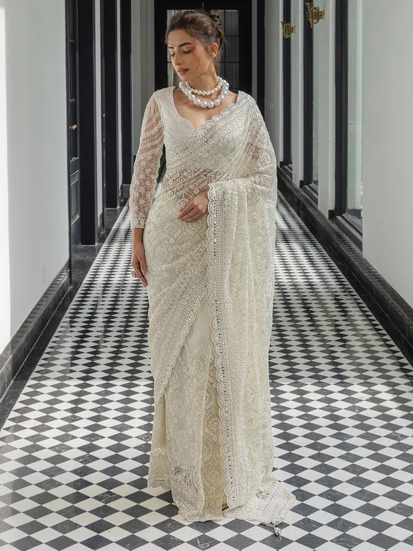 Gorgeous white net saree for wedding