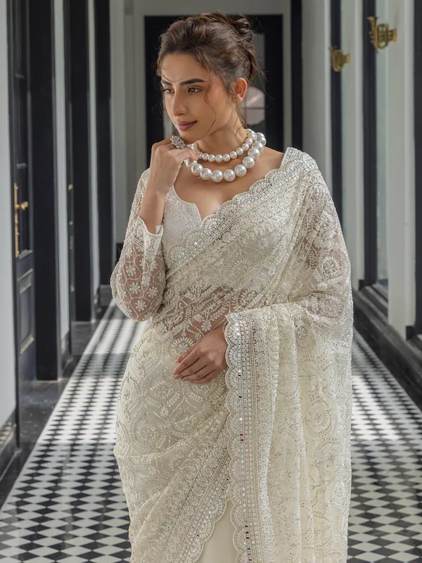 Gorgeous white net saree for wedding