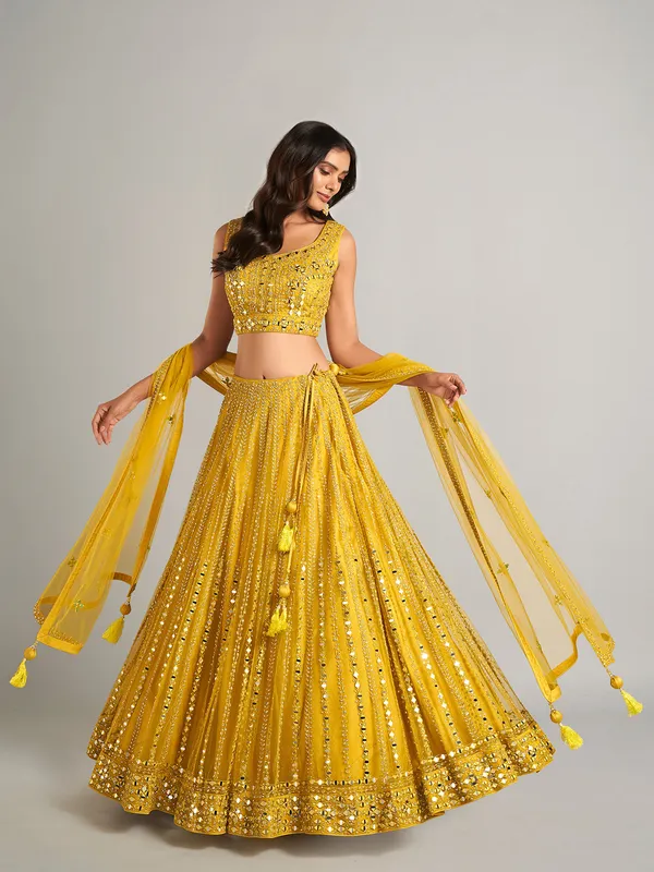 Gorgeous yellow net lehenga choli for party wear