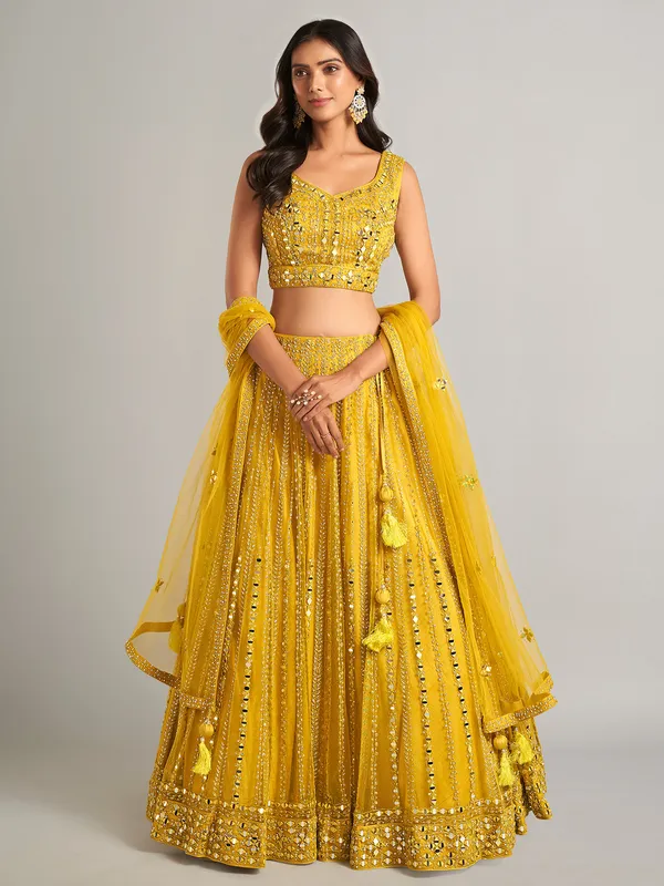 Gorgeous yellow net lehenga choli for party wear