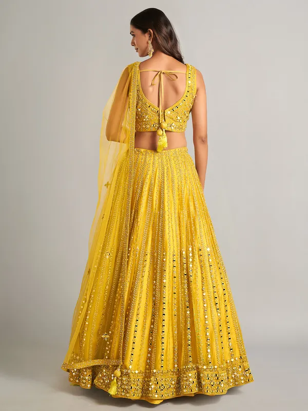 Gorgeous yellow net lehenga choli for party wear