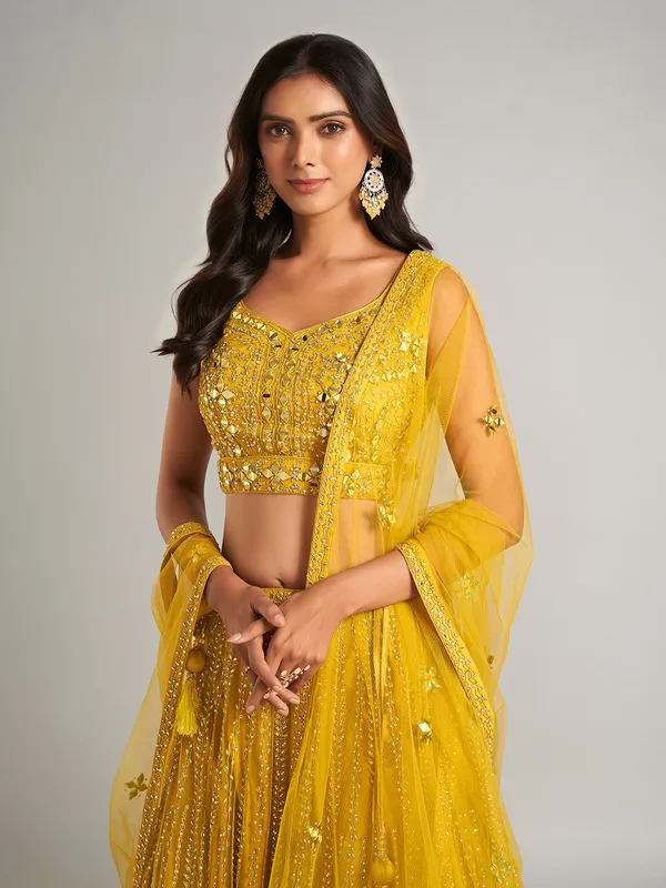 Gorgeous yellow net lehenga choli for party wear