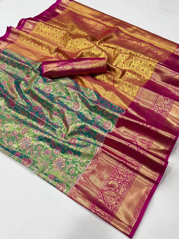 Graceful green silk saree with zari weaving charm