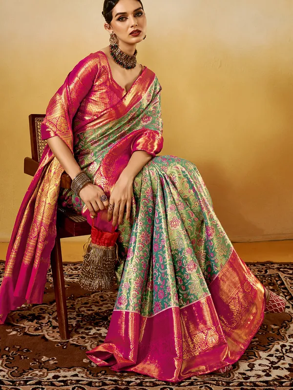 Graceful green silk saree with zari weaving charm