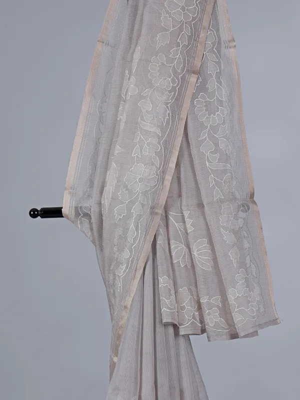 Graceful grey semi organza saree with fine embroidery detailing