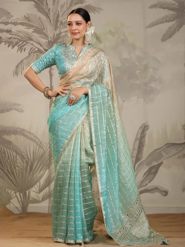Green and cream organza saree
