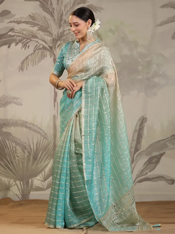 Green and cream organza saree