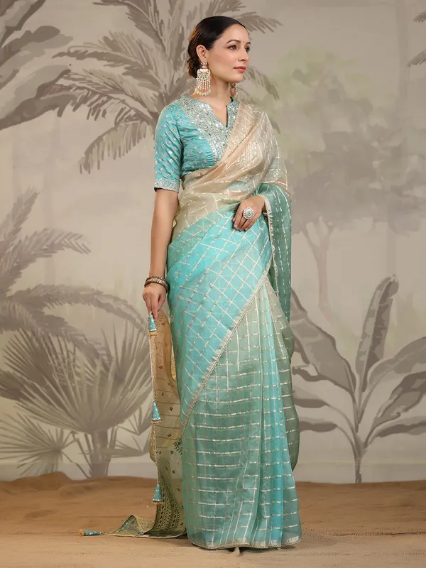 Green and cream organza saree