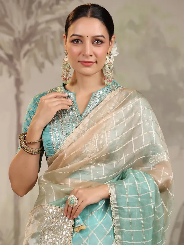 Green and cream organza saree