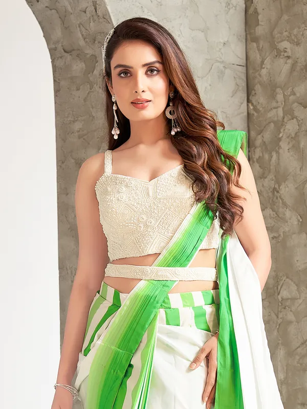 Green and white pre-stitched saree