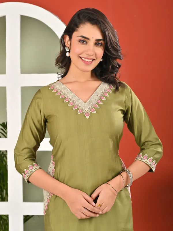 Green cotton silk embroidered kurti with two pockets