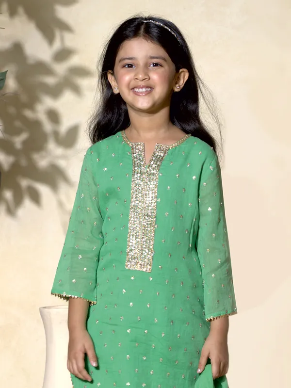 Green cotton silk sequined palazzo salwar suit with dupatta