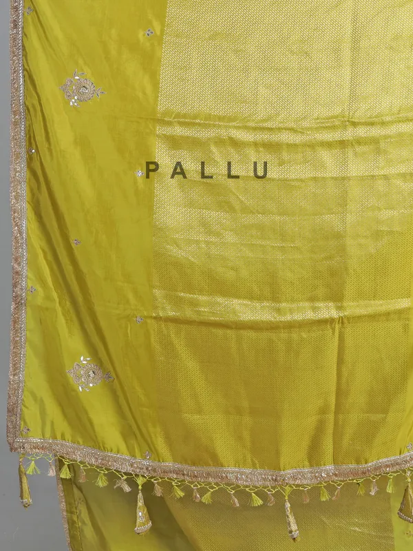 Green dola silk saree with zardosi & gota accents
