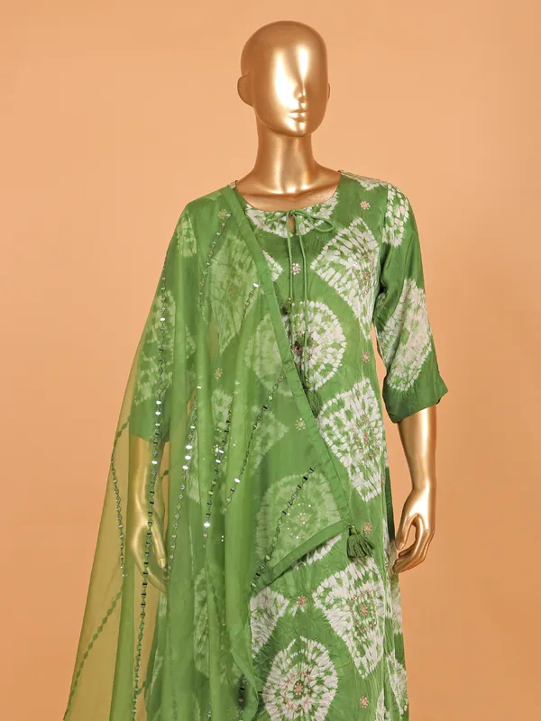 Green festive printed silk salwar suit