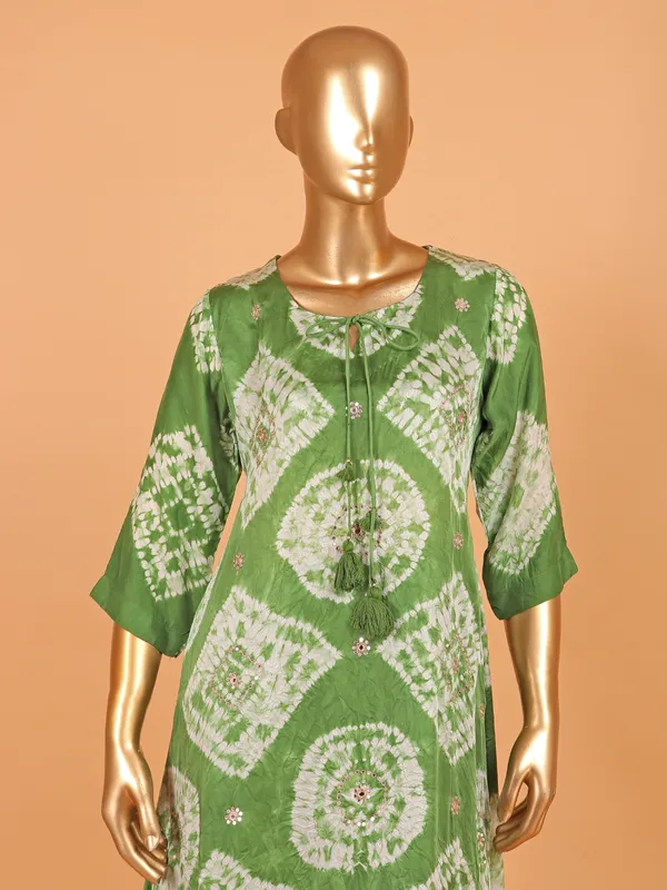 Green festive printed silk salwar suit